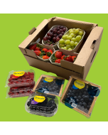Raspberries, Blueberries, Strawberries, Blackberries, Red Grapes, and Green Grapes in display for London Fruit delivery.